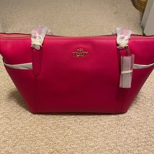 NWT beautiful bright pink Coach Tote.